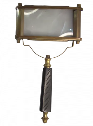 Rectangular brass-frame magnifying glass with carved dark handle